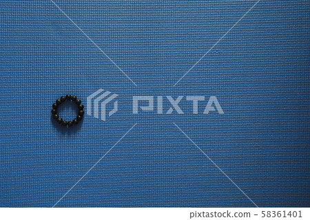 Mat for practicing yoga on the floor. Healthy lifestyle. Mat for practicing yoga on the floor. Healthy lifestyle. 58361401