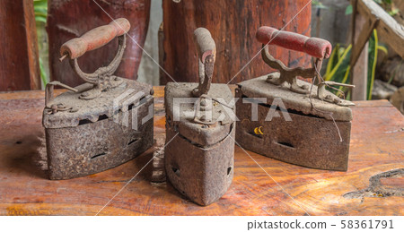 Old charcoal irons 58361791