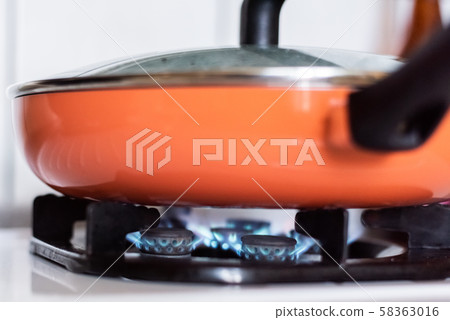 stove top burner igniting 58363016