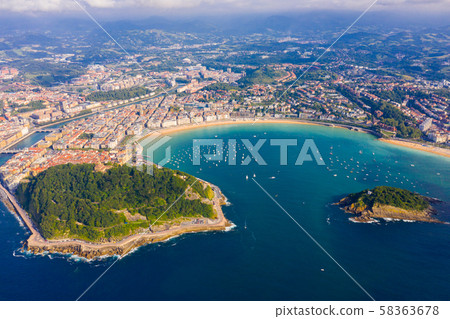 High view of San-Sebastian with Beach of La Concha and boats at sea High view of San-Sebastian with Beach of La Concha and boats at sea 58363678