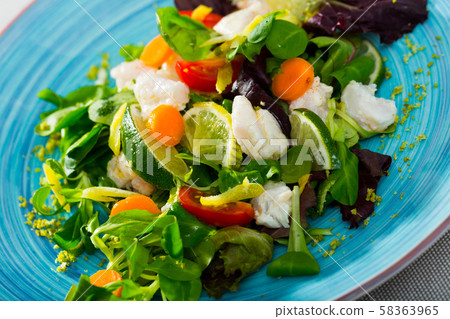 Salad with cod and fresh greens Salad with cod and fresh greens 58363965