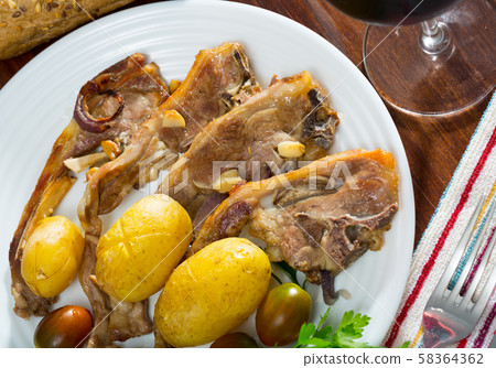 Roasted lamb ribs with potato Roasted lamb ribs with potato 58364362