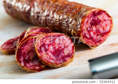 Spanish dried pork sausage Salchichon Spanish dried pork sausage Salchichon 58364412