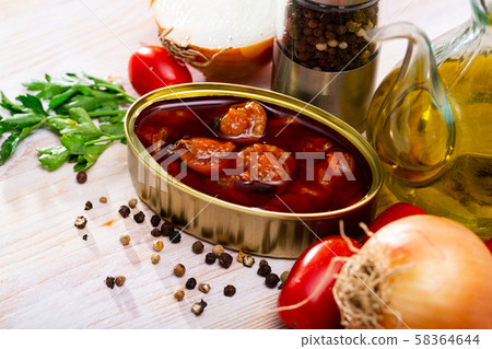 Can of scallop Chlamys varia in sauce Can of scallop Chlamys varia in sauce 58364644