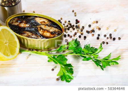 Stuffed whole squid in ink sauce 58364646