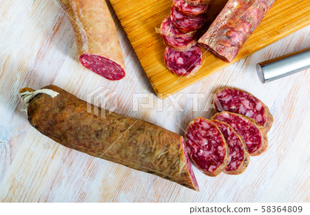 Spanish dry cured pork sausage Salchichon 58364809