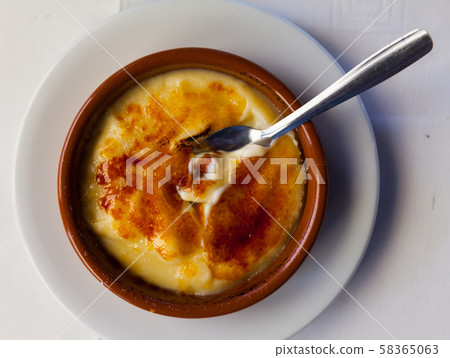 Tasty dessert catalana crema served with caramel crust, nobody 58365063