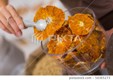 Illustration of container with dried orange 58365273