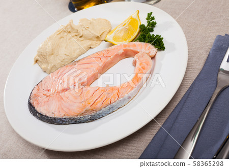 Seared salmon and hummus Seared salmon and hummus 58365298