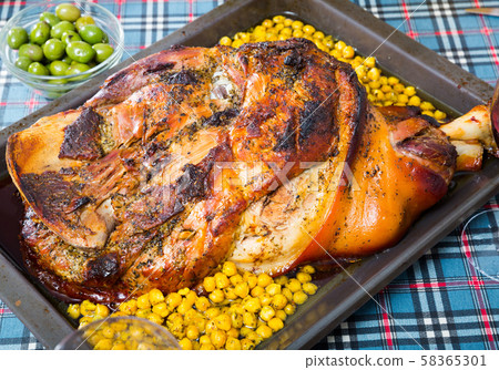 Plate with baked in oven gammon of bacon with garbanzo Plate with baked in oven gammon of bacon with garbanzo 58365301