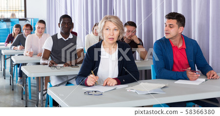 Students at extension courses Students at extension courses 58366380