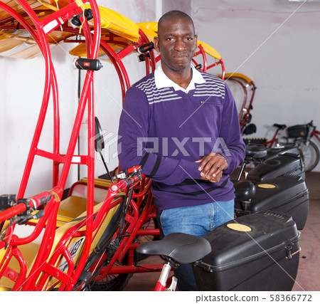 African American driver of pedicab African American driver of pedicab 58366772