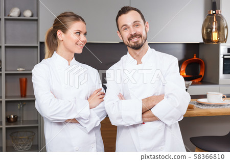 Two confident chefs 58366810