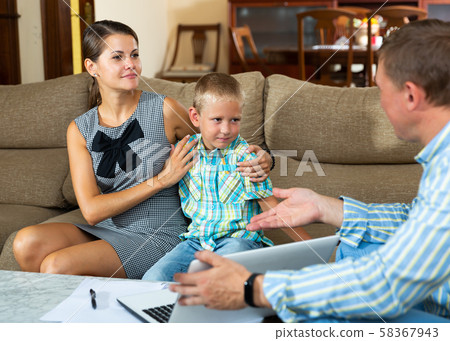 Consultant making presentation for woman at home Consultant making presentation for woman at home 58367943