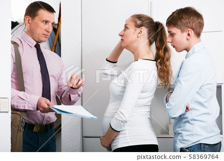 Upset family meeting social worker 58369764