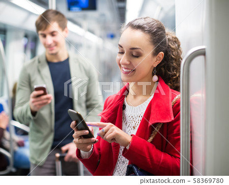 Passengers in metro wagon. Passengers in metro wagon. 58369780