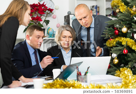Worried team working at office 58369891