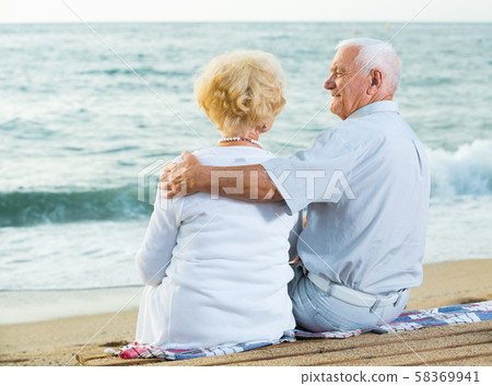 portrait of pensioners on the sea coast portrait of pensioners on the sea coast 58369941