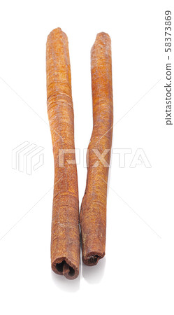 Cinnamon Sticks Stacked isolated on White Cinnamon Sticks Stacked isolated on White 58373869