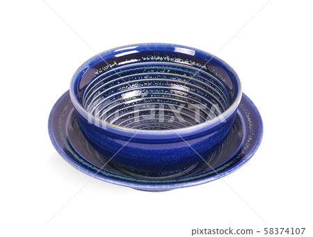 Blue bowl on the white background Blue bowl on the white background 58374107