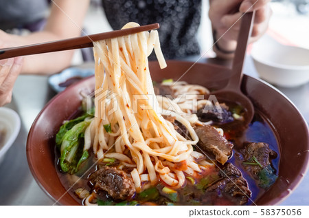 hot braised beef noodle soup 58375056