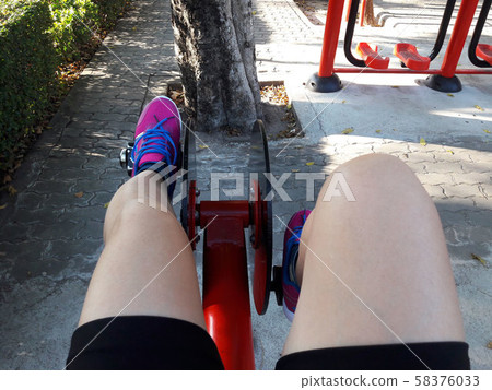 Use of exercise machines.Stationary bike Use of exercise machines.Stationary bike 58376033