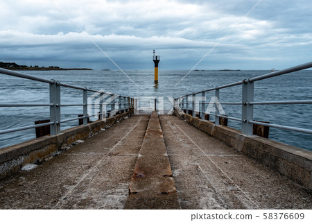 Jetty to ferry in the harbour of Roscoff 58376609