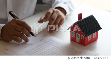 Customer signing contract about home loan Customer signing contract about home loan 58377655