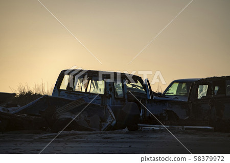 abondoned cars silhouette at sunset 58379972