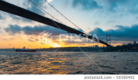 Sunset view to Bosphorus Sultan Mehmet Bridge in Istanbul, Turkey Sunset view to Bosphorus Sultan Mehmet Bridge in Istanbul, Turkey 58380492