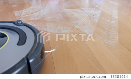 Cleaning robot during cleaning Cleaning robot during cleaning 58381914