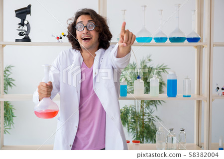 Funny male chemist working in the lab Funny male chemist working in the lab 58382004