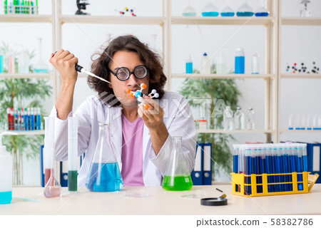 Funny male chemist working in the lab Funny male chemist working in the lab 58382786