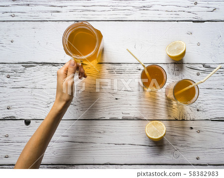 Kombucha fermenting tea with symbiotic culture  58382983