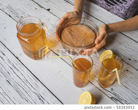 Kombucha fermenting tea with symbiotic culture  58383052
