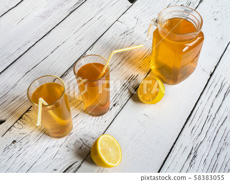 Kombucha fermenting tea with symbiotic culture  58383055