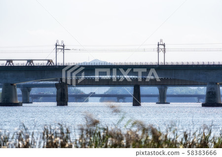 train track bridge over bukhangang river 58383666