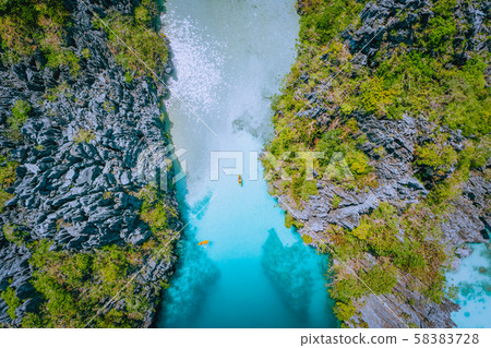 Aerial top down view of entrance into Big Lagoon at Miniloc Island, El Nido, Palawan, Philippines Aerial top down view of entrance into Big Lagoon at Miniloc Island, El Nido, Palawan, Philippines 58383728