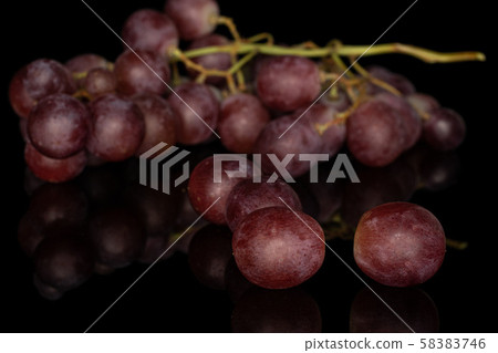 Rose wine grape isolated on black glass Rose wine grape isolated on black glass 58383746