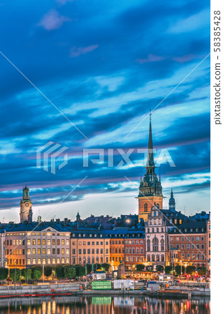 Stockholm, Sweden. Scenic View Of Skyline At Evening Night. Tower Of Storkyrkan - The Great Church 58385428