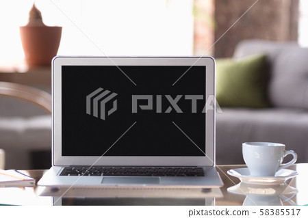 Mock up empty black laptop screen on blured background Mock up empty black laptop screen on blured background 58385517