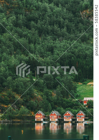 Flam, Norway. Famous Red Wooden Docks In Summer Evening. Small Tourist Town Of Flam On Western Side 58385542