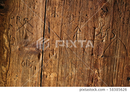Borgund, Norway. Carved Details Of Famous Wooden Norwegian Landmark Stavkirke. Ancient Old Wooden Borgund, Norway. Carved Details Of Famous Wooden Norwegian Landmark Stavkirke. Ancient Old Wooden 58385626