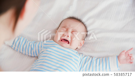 mother with her baby 58385717