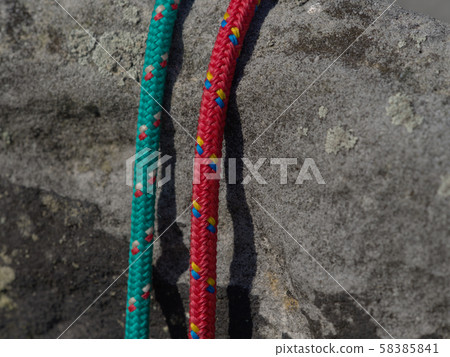 Two old fashion climb nylon ropes. Detail of Two old fashion climb nylon ropes. Detail of 58385841