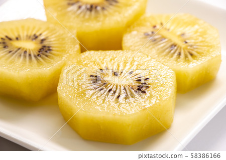 Kiwi fruit. (The state cut into bite size as dessert.) 58386166