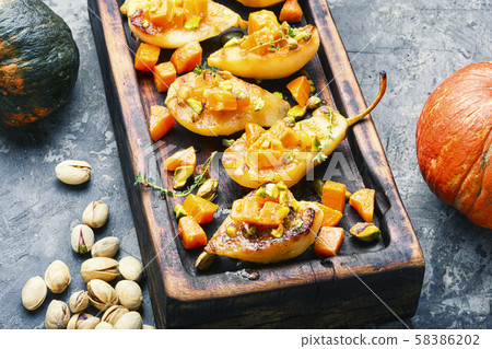 Ripe baked pear with pumpkin Ripe baked pear with pumpkin 58386202