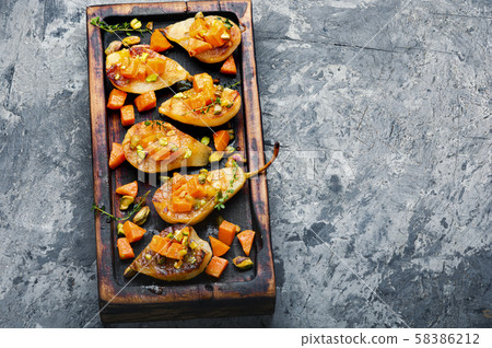 Ripe baked pear with pumpkin Ripe baked pear with pumpkin 58386212