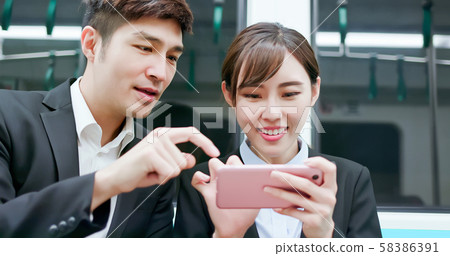 woman play game with smartphone woman play game with smartphone 58386391