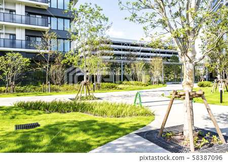 Urban landscape with green and tower apartment 58387096